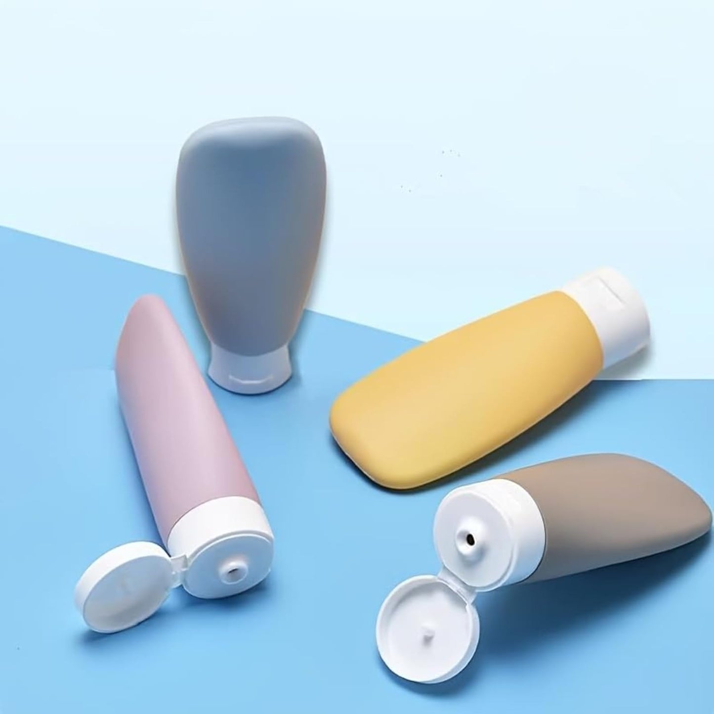 Refillable Squeeze Bottles (Set of 4) for Lotions, Shampoo and Conditioner